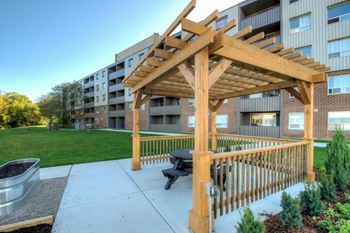 Covered patio with a picnic table  at Platts Crossing, London, ON, N6H 4P4